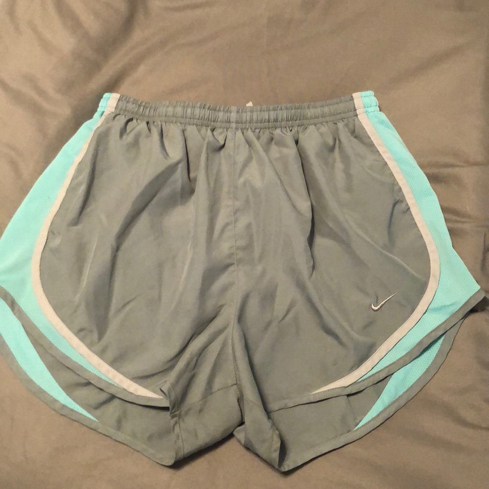 gray & blue nike shorts